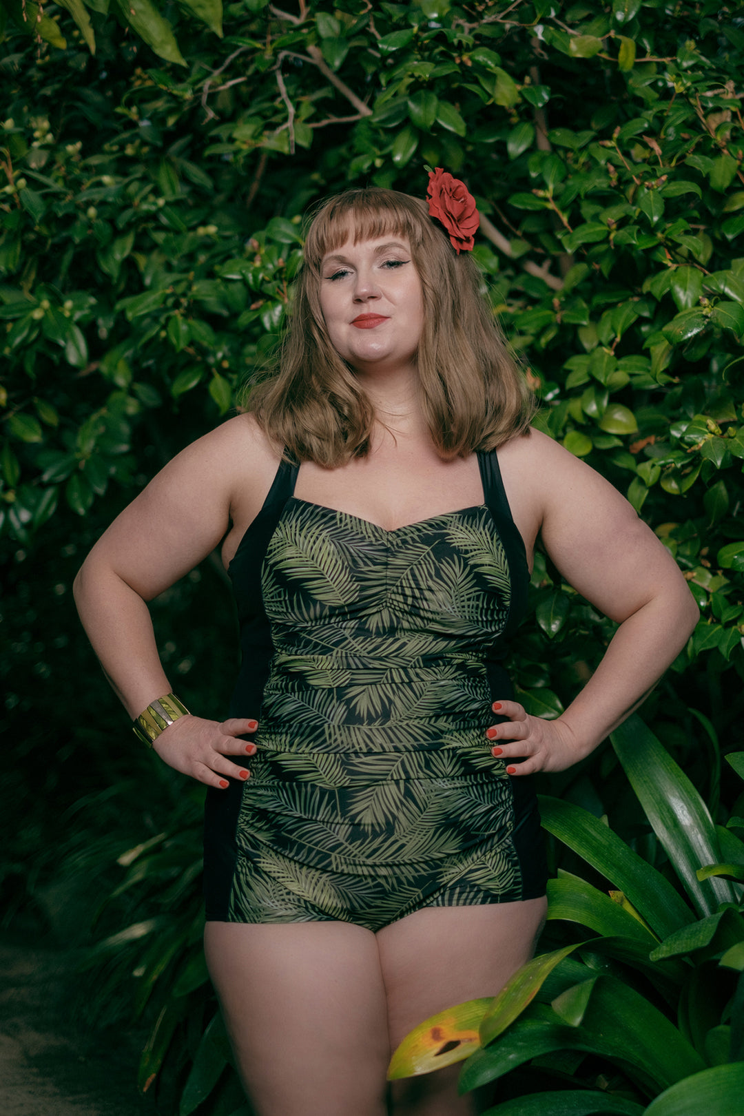 Suntime swimsuit with ruffled front on model from front