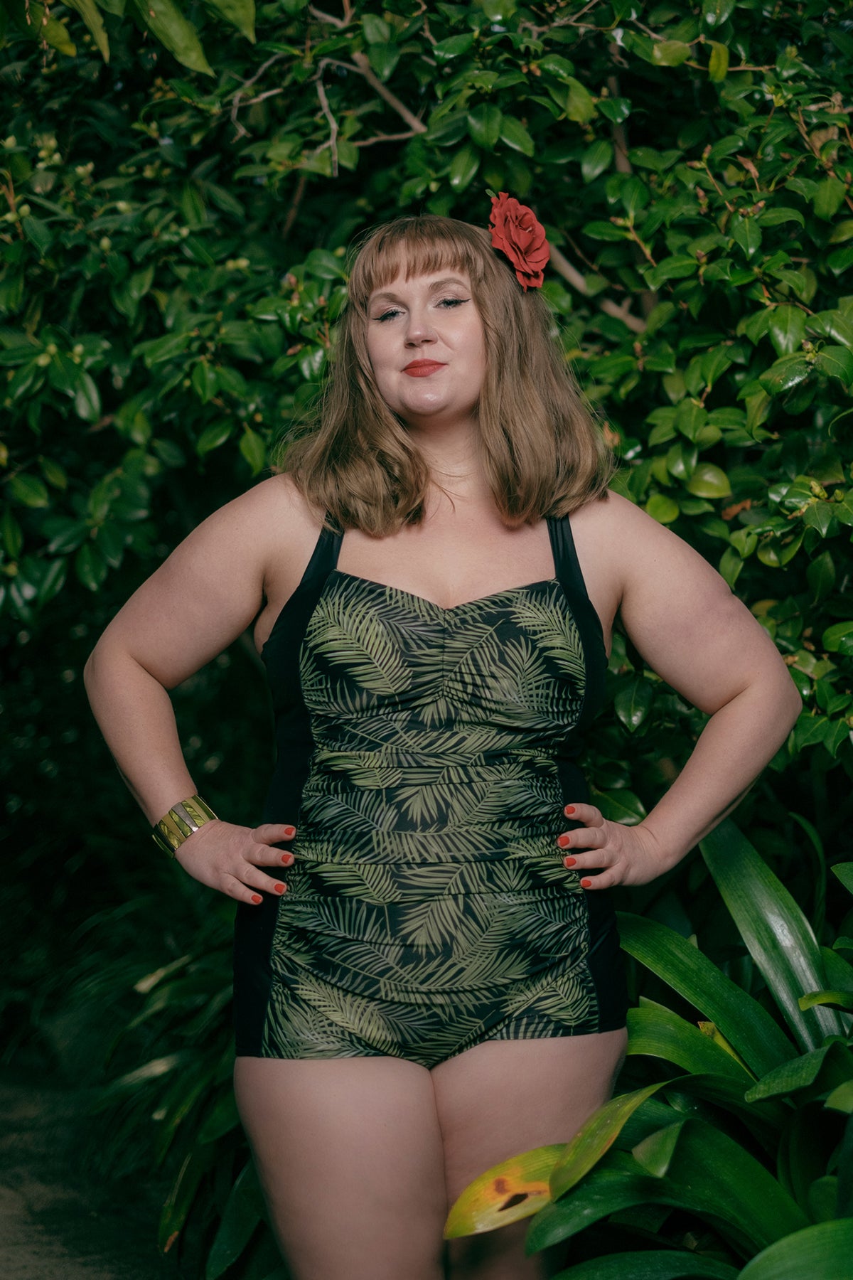 Suntime swimsuit with ruffled front on model from front