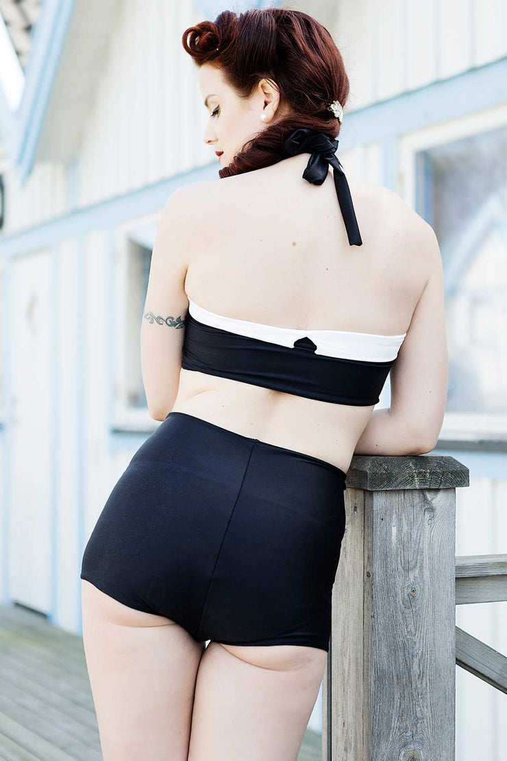 Photo of model showing how Black Hello Sailor bikini sits from the back.