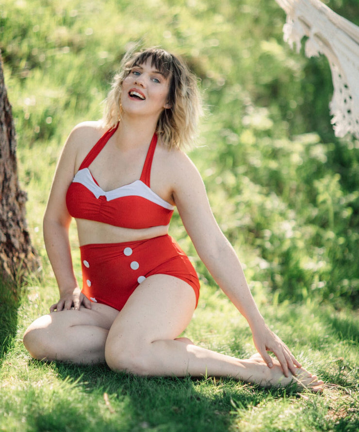 Underbara Clara laughing wearing the red Hello Sailor bikini