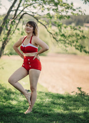 Underbara Clara standing wearing the red Hello sailor bikini